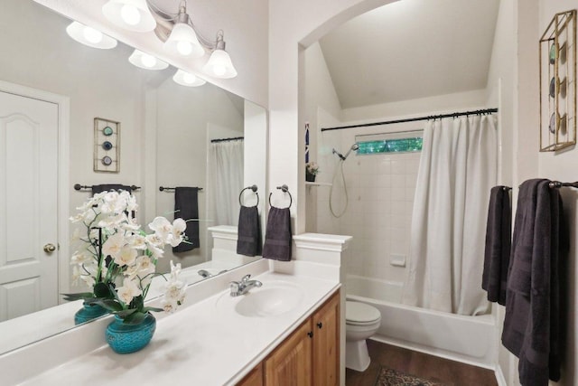 20737 Kearney Hill Rd, Pflugerville, TX 78660 - bathroom featuring vanity, shower / bath combination with curtain, and wood finished floors