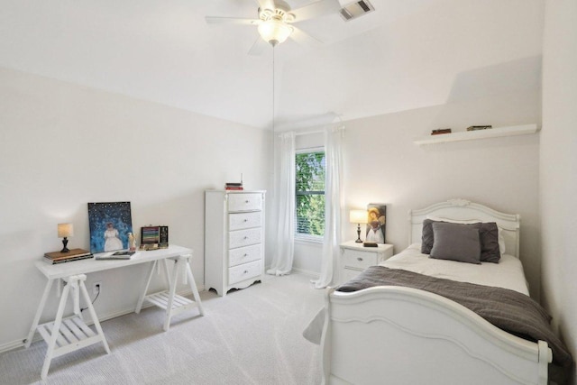 20737 Kearney Hill Rd, Pflugerville, TX 78660 - bedroom with light colored carpet, a desk, a ceiling fan, and lofted ceiling