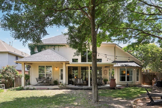 20737 Kearney Hill Rd, Pflugerville, TX 78660 - back of house with a patio area and a shingled roof