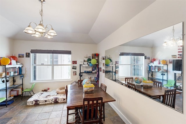 6002 Rain Creek Pkwy, Austin, TX 78759 - dining space with a chandelier, stone tile floors, and lofted ceiling