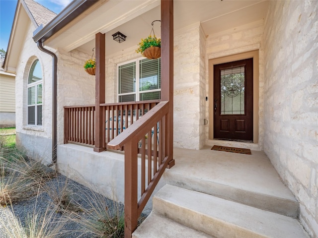 7 Redwood Cir, Wimberley, TX 78676 - entrance to property featuring a porch and stone siding