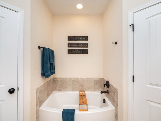 7 Redwood Cir, Wimberley, TX 78676 - bathroom with a garden tub and recessed lighting