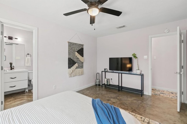 1514 Turtle Creek Blvd, Austin, TX 78745 - bedroom with a sink, baseboards, ceiling fan, and ensuite bathroom