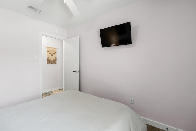 1514 Turtle Creek Blvd, Austin, TX 78745 - bedroom featuring a ceiling fan and baseboards