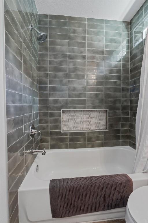 1514 Turtle Creek Blvd, Austin, TX 78745 - bathroom with shower / tub combo and toilet