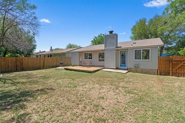 1514 Turtle Creek Blvd, Austin, TX 78745 - rear view of house featuring a chimney and a wooden deck