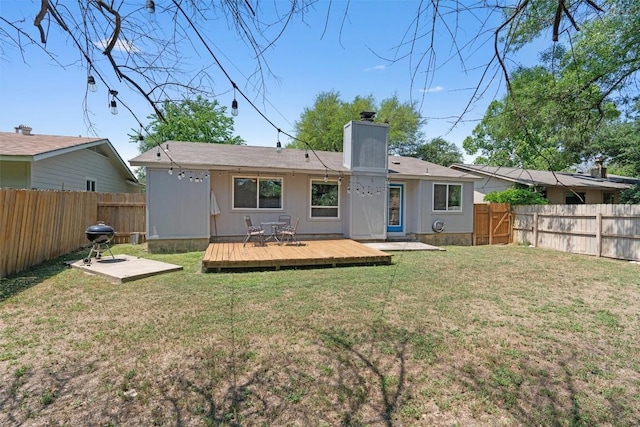 1514 Turtle Creek Blvd, Austin, TX 78745 - rear view of house with a wooden deck and a chimney