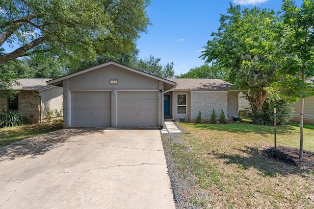 1514 Turtle Creek Blvd, Austin, TX 78745 - view of front facade with an attached garage, driveway, and a front lawn