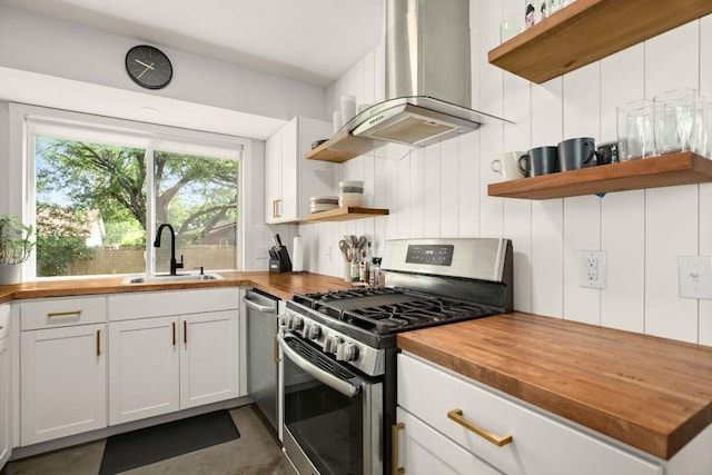 1514 Turtle Creek Blvd, Austin, TX 78745 - kitchen featuring wood counters, open shelves, and appliances with stainless steel finishes