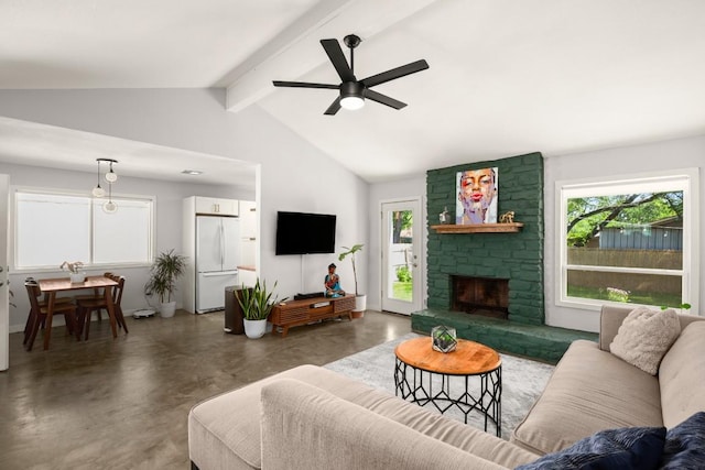 1514 Turtle Creek Blvd, Austin, TX 78745 - living room with concrete floors, healthy amount of natural light, ceiling fan, and a fireplace