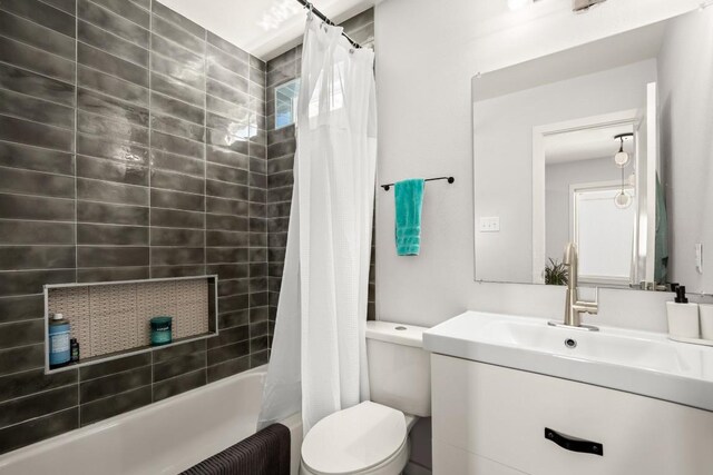 1514 Turtle Creek Blvd, Austin, TX 78745 - bathroom featuring vanity, shower / bathtub combination with curtain, and toilet