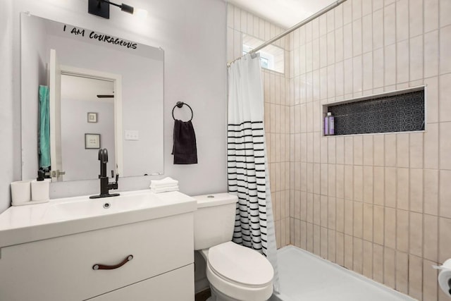 1514 Turtle Creek Blvd, Austin, TX 78745 - full bathroom featuring vanity, toilet, and a tile shower