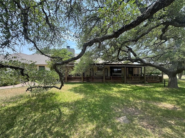 4006 Spanish Oak Ln, Dripping Springs, TX 78620 - view of green lawn with a porch