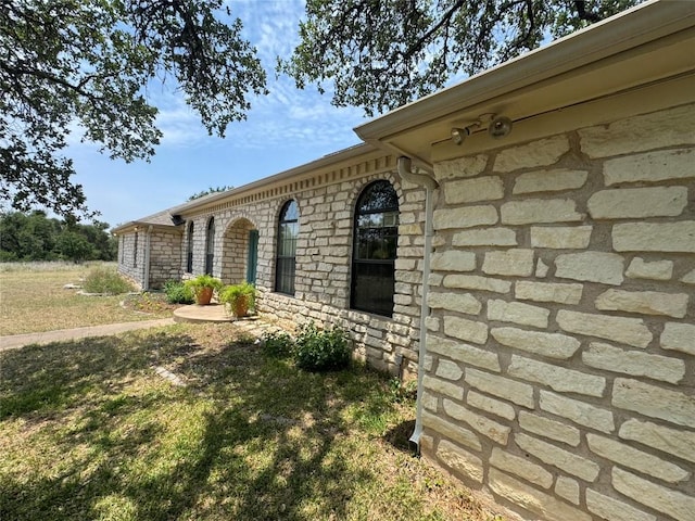 4006 Spanish Oak Ln, Dripping Springs, TX 78620 - view of side of property with stone siding