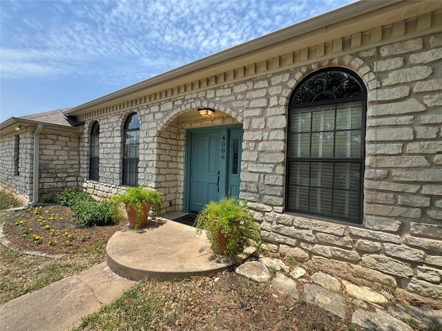 4006 Spanish Oak Ln, Dripping Springs, TX 78620 - doorway to property featuring stone siding