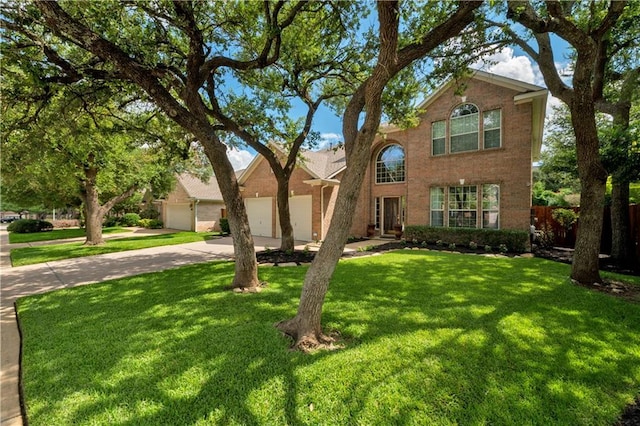 1411 Hunter Ace Way, Cedar Park, TX 78613 - traditional-style house with concrete driveway, brick siding, and an attached garage