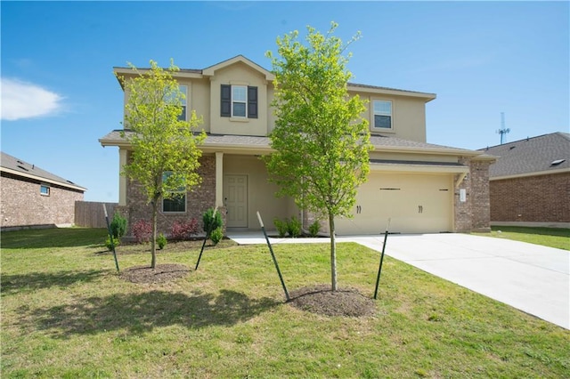 1036 Hillrose Dr, Leander, TX 78641 - traditional-style home with driveway, an attached garage, stucco siding, and a front lawn