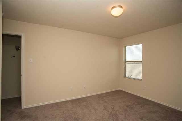1036 Hillrose Dr, Leander, TX 78641 - unfurnished room featuring dark colored carpet and baseboards