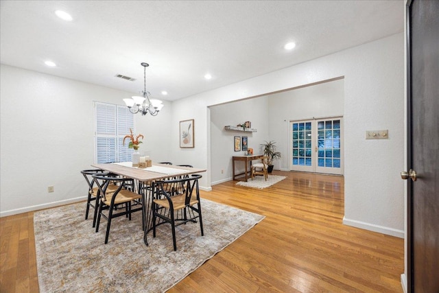 11900 Tunnel Trl, Manchaca, TX 78652 - dining area with light wood-type flooring, a chandelier, recessed lighting, and baseboards