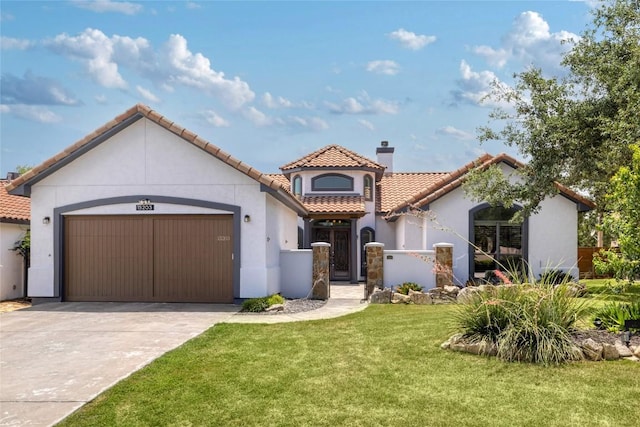 15203 Lariat Trl, Austin, TX 78734 - mediterranean / spanish-style house featuring a tiled roof, concrete driveway, stucco siding, and a garage