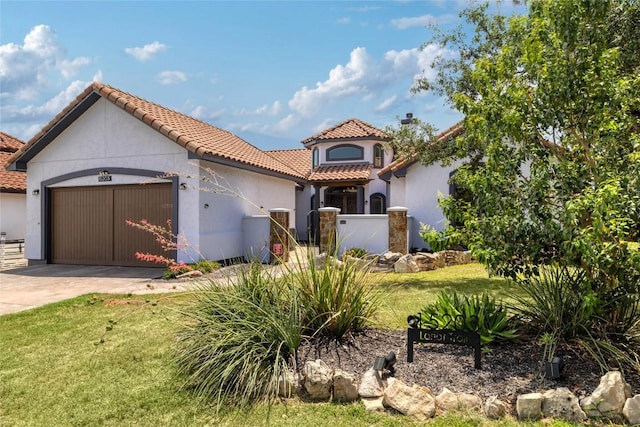 15203 Lariat Trl, Austin, TX 78734 - mediterranean / spanish house featuring driveway, a garage, a tiled roof, stucco siding, and a front lawn