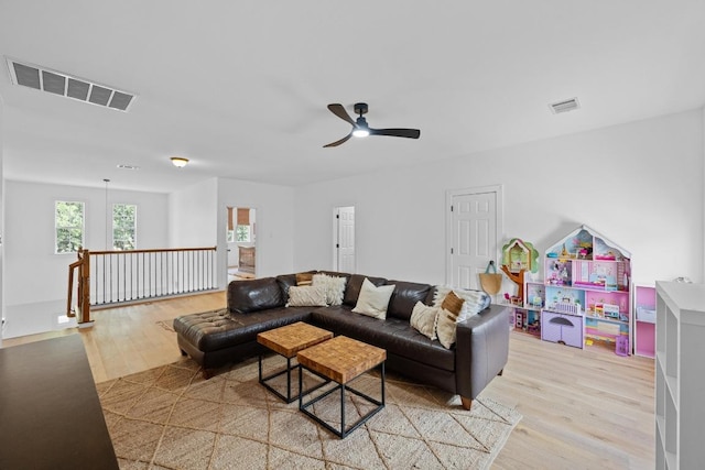 140 Vincas Shadow Ct, Driftwood, TX 78619 - living room with light wood finished floors and ceiling fan