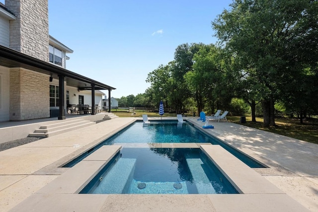 140 Vincas Shadow Ct, Driftwood, TX 78619 - view of pool featuring a patio area and a pool with connected hot tub