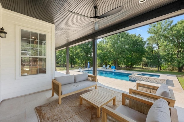 140 Vincas Shadow Ct, Driftwood, TX 78619 - view of patio / terrace with an outdoor living space, ceiling fan, view of scattered trees, and a pool with connected hot tub