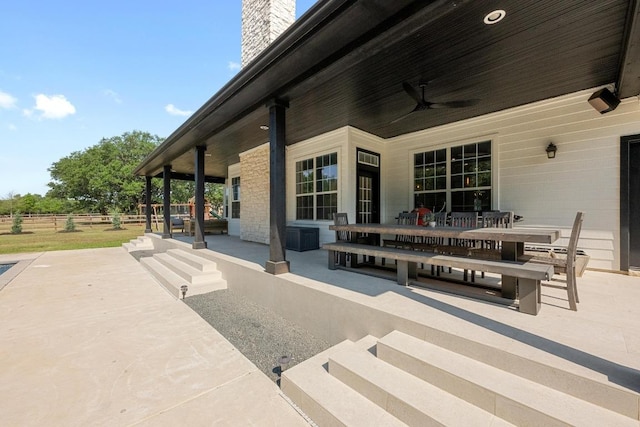 140 Vincas Shadow Ct, Driftwood, TX 78619 - view of patio with ceiling fan and outdoor dining area