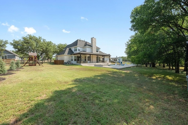 140 Vincas Shadow Ct, Driftwood, TX 78619 - view of yard featuring a playground and a patio