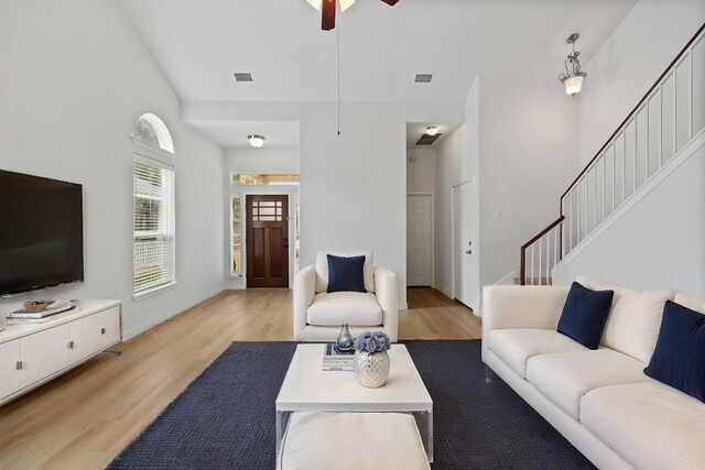 1708 Rockland Dr Unit 177, Austin, TX 78748 - living room with light wood finished floors, stairs, and a ceiling fan