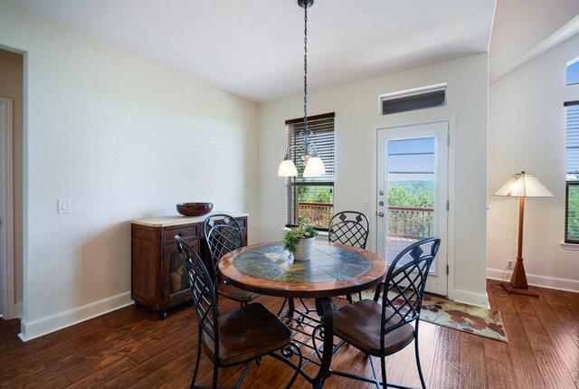 3200 Argento Pl, Cedar Park, TX 78613 - dining space with dark wood finished floors and baseboards