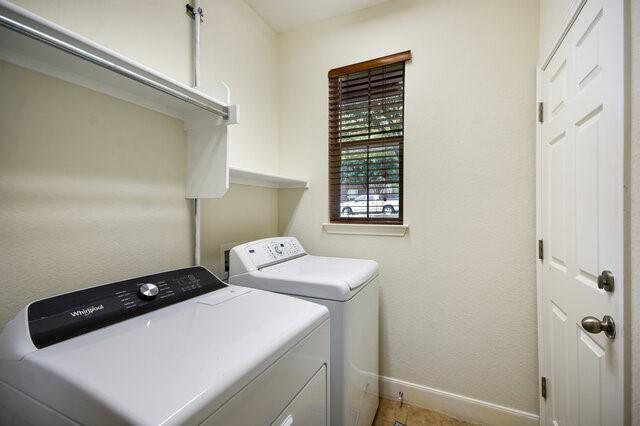 3200 Argento Pl, Cedar Park, TX 78613 - laundry area featuring baseboards and washing machine and dryer