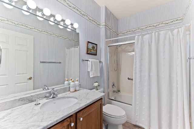 103 Winecup Way, Georgetown, TX 78633 - bathroom featuring wallpapered walls, vanity, shower / bathtub combination with curtain, and toilet