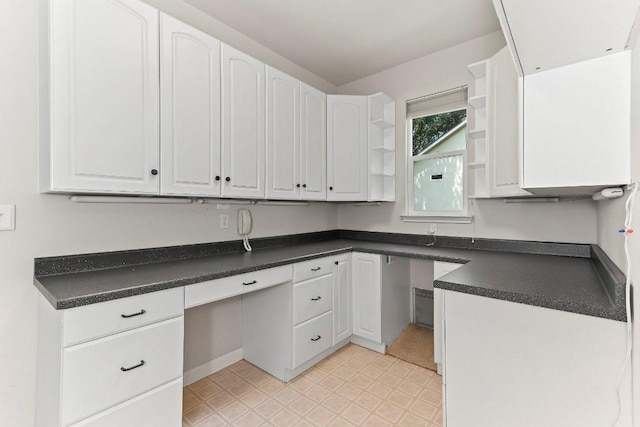103 Winecup Way, Georgetown, TX 78633 - kitchen featuring open shelves, light flooring, white cabinets, and dark countertops