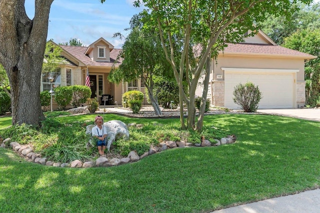103 Winecup Way, Georgetown, TX 78633 - view of property hidden behind natural elements with stone siding, an attached garage, a front yard, and concrete driveway