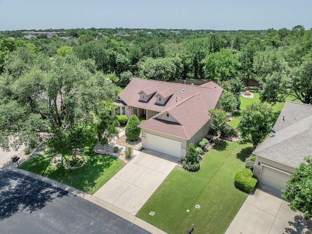 103 Winecup Way, Georgetown, TX 78633 - view from above of property with a heavily wooded area