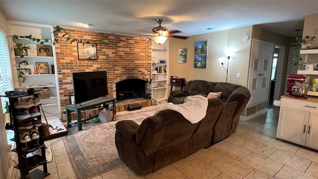3307 Whitepine Dr, Austin, TX 78757 - living room with ceiling fan, a brick fireplace, and light tile patterned floors