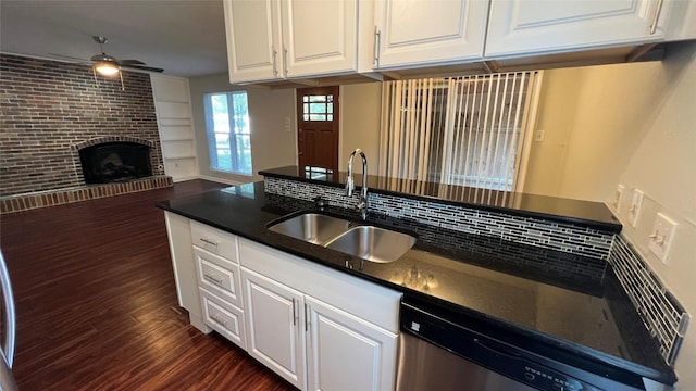3307 Whitepine Dr, Austin, TX 78757 - kitchen with a sink, dishwasher, dark wood-style flooring, ceiling fan, and white cabinetry