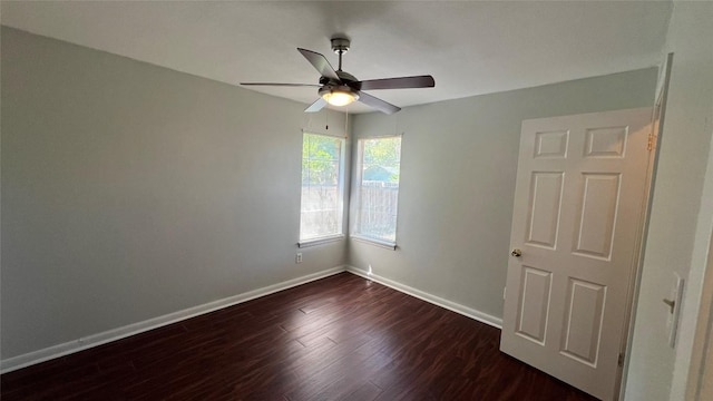 3307 Whitepine Dr, Austin, TX 78757 - empty room with a ceiling fan, dark wood-style flooring, and baseboards