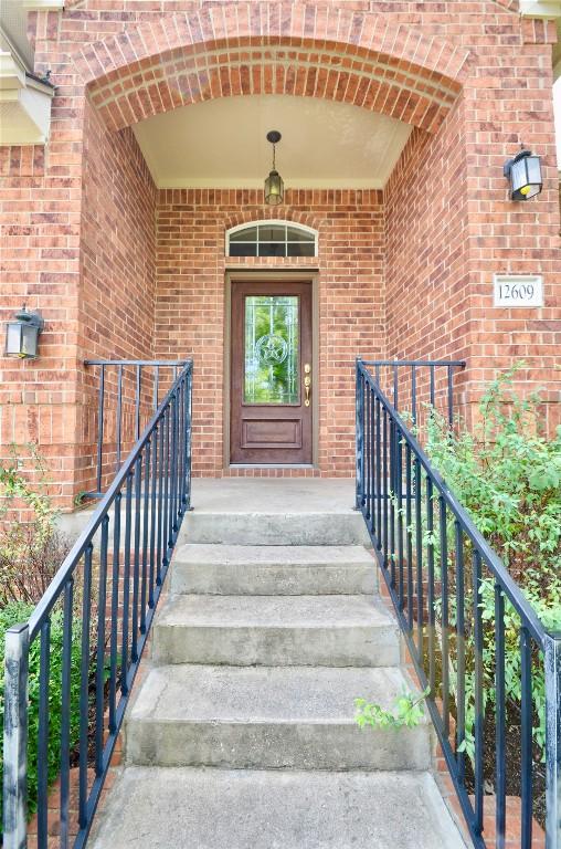 12609 Lee Park Ln, Austin, TX 78732 - property entrance featuring brick siding