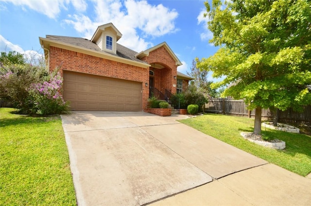 12609 Lee Park Ln, Austin, TX 78732 - traditional-style house with brick siding, driveway, an attached garage, and roof with shingles