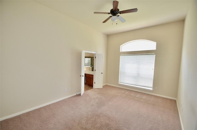 12609 Lee Park Ln, Austin, TX 78732 - spare room with carpet floors, baseboards, and ceiling fan