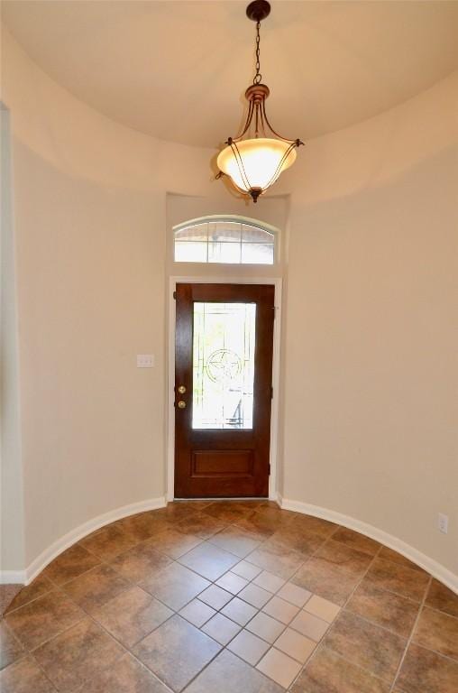 12609 Lee Park Ln, Austin, TX 78732 - tiled foyer entrance featuring baseboards