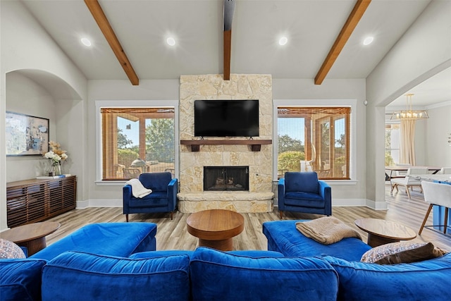 101 Aldea St, Georgetown, TX 78633 - living room with a chandelier, wood finished floors, recessed lighting, and a fireplace