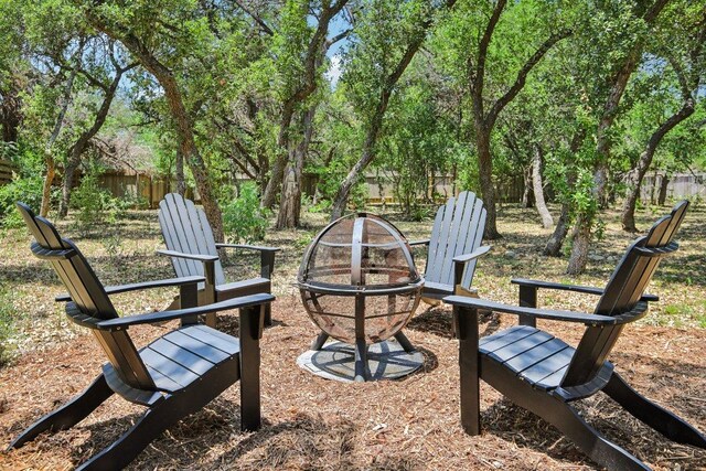 400 Goodnight Trl, Dripping Springs, TX 78620 - view of yard with a fire pit