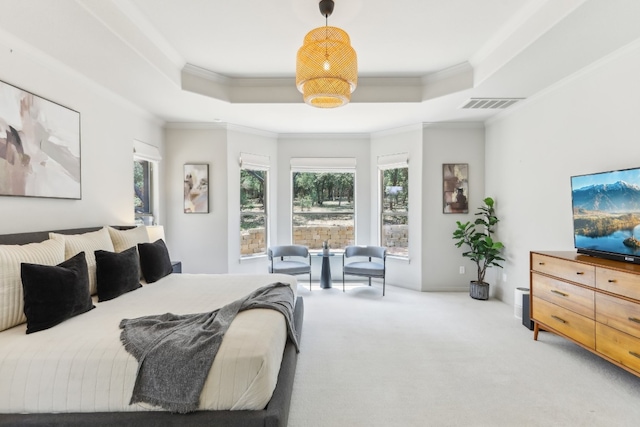 400 Goodnight Trl, Dripping Springs, TX 78620 - carpeted bedroom with a tray ceiling, multiple windows, and crown molding