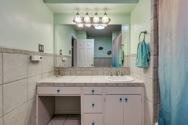 3002 Stardust Dr, Austin, TX 78757 - bathroom featuring tile walls, vanity, tile patterned flooring, wainscoting, and a shower with shower curtain