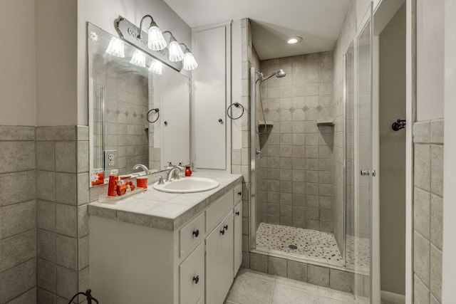 3002 Stardust Dr, Austin, TX 78757 - full bath with a stall shower, vanity, and tile patterned floors