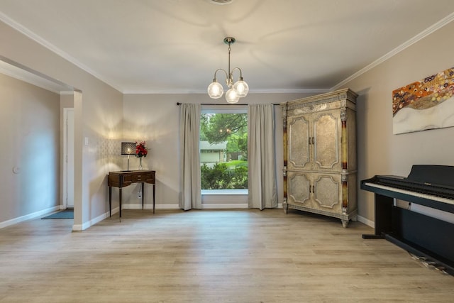 3002 Stardust Dr, Austin, TX 78757 - entrance foyer featuring light wood-type flooring, a chandelier, crown molding, and baseboards